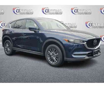 2021 Mazda CX-5 Touring is a Blue 2021 Mazda CX-5 Touring SUV in Plainfield CT