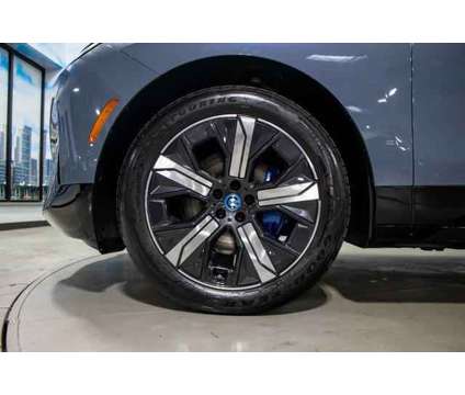 2024 BMW iX xDrive50 is a 2024 BMW 325 Model iX SUV in Lake Bluff IL