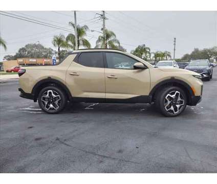 2023 Hyundai Santa Cruz Limited is a Tan 2023 Truck in Melbourne FL