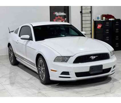 2014 Ford Mustang for sale is a White 2014 Ford Mustang Car for Sale in Houston TX