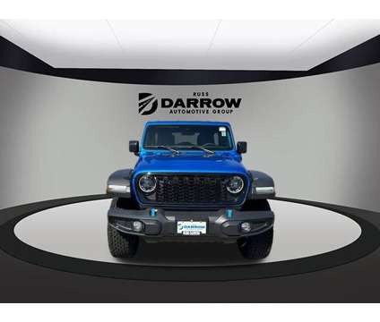 2024 Jeep Wrangler Willys 4xe is a Blue 2024 Jeep Wrangler SUV in Milwaukee WI