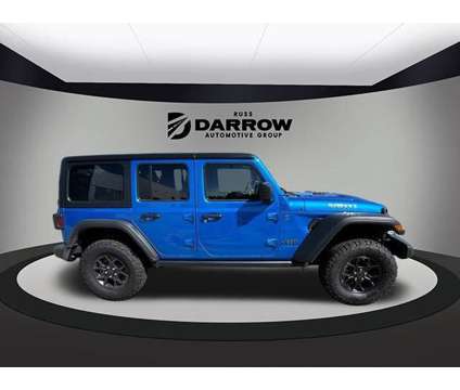 2024 Jeep Wrangler Willys 4xe is a Blue 2024 Jeep Wrangler SUV in Milwaukee WI
