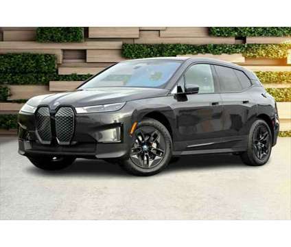 2024 BMW iX xDrive50 is a Grey 2024 BMW 325 Model iX SUV in Seaside CA