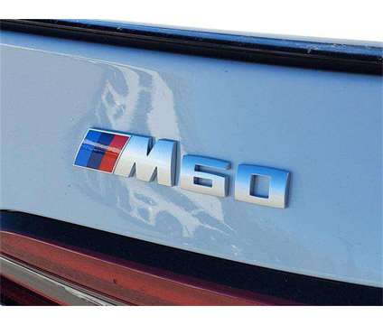 2024 BMW i5 M60 is a White 2024 Sedan in Milford DE