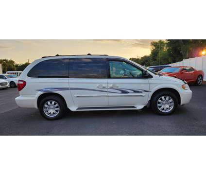 2005 Chrysler Town &amp; Country for sale is a White 2005 Chrysler town &amp; country Car for Sale in Tampa FL
