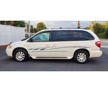 2005 Chrysler Town &amp; Country for sale is a White 2005 Chrysler town &amp; country Car for Sale in Tampa FL