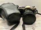 Nikon FM10 35mm SLR Film Camera with 35-70 mm lens Kit [phone removed]