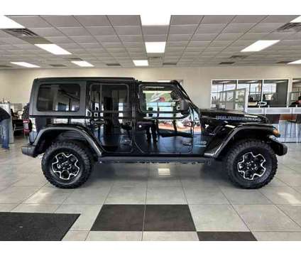2022 Jeep Wrangler Unlimited Rubicon 4xe is a Black 2022 Jeep Wrangler Unlimited Rubicon SUV in Bay City TX