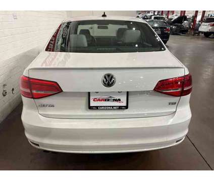 2015 Volkswagen Jetta 1.8T SE is a White 2015 Volkswagen Jetta 1.8T SE Sedan in Chandler AZ