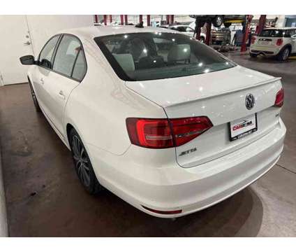 2015 Volkswagen Jetta 1.8T SE is a White 2015 Volkswagen Jetta 1.8T SE Sedan in Chandler AZ