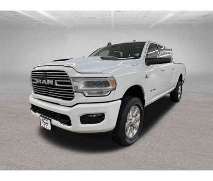 2024 Ram 2500 Laramie is a White 2024 RAM 2500 Model Laramie Truck in Ottumwa IA