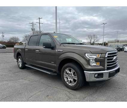 2016 Ford F-150 XLT is a Tan 2016 Ford F-150 XLT Car for Sale in Southaven MS