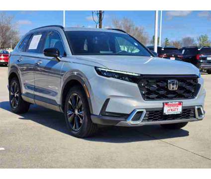 2023 Honda CR-V Hybrid Sport Touring is a Silver, White 2023 Honda CR-V Hybrid in Katy TX