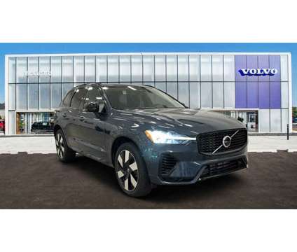 2024 Volvo XC60 Recharge Plug-In Hybrid Plus Dark Theme is a Blue 2024 Volvo XC60 3.2 Trim Hybrid in Barrington IL