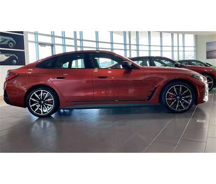 2024 BMW i4 M50 is a Orange 2024 Car for Sale in Reno NV