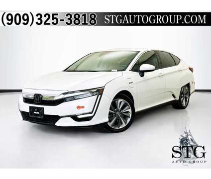 2019 Honda Clarity Plug-In Hybrid Touring is a White 2019 Honda Clarity Plug-In Hybrid Touring Hybrid in Bellflower CA