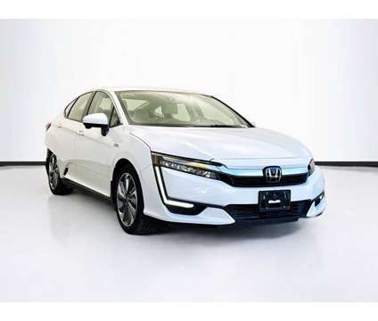 2019 Honda Clarity Plug-In Hybrid Touring is a White 2019 Honda Clarity Plug-In Hybrid Touring Hybrid in Bellflower CA