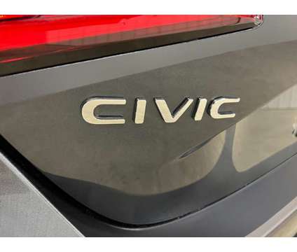 2024 Honda Civic Gray, new is a Grey 2024 Honda Civic EX-L Hatchback in Union NJ