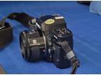 Minolta Maxxum 7000AF 35mm SLR Film Camera w/ 50mm f1.7 lens, Flash, Strap, Bag