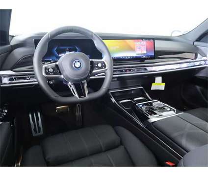2024 BMW i7 e50 Sales Demo is a White 2024 e50 Sedan in Edmond OK