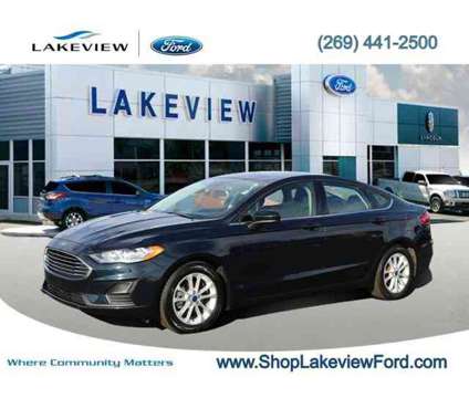 2020 Ford Fusion SE is a Blue 2020 Ford Fusion SE Sedan in Battle Creek MI