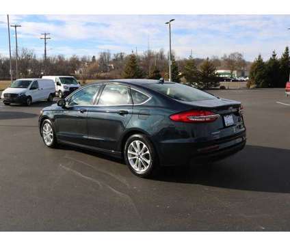 2020 Ford Fusion SE is a Blue 2020 Ford Fusion SE Sedan in Battle Creek MI