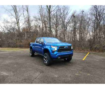 2024 Chevrolet Silverado 1500 RST Black Widow Package is a Blue 2024 Chevrolet Silverado 1500 Truck in Monroe MI