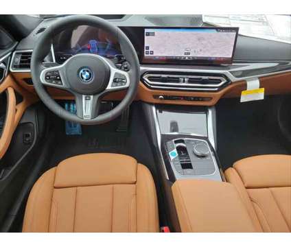 2024 BMW i4 xDrive40 is a Blue 2024 Sedan in Scranton PA