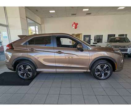 2024 Mitsubishi Eclipse Cross SEL is a Tan 2024 Mitsubishi Eclipse SE SUV in Randallstown MD