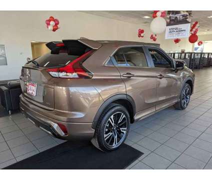 2024 Mitsubishi Eclipse Cross SEL is a Tan 2024 Mitsubishi Eclipse SE SUV in Randallstown MD