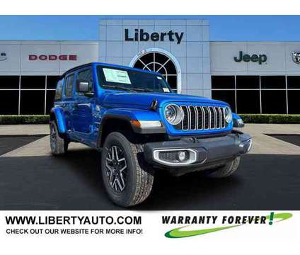 2024 Jeep Wrangler Sahara is a Blue 2024 Jeep Wrangler Sahara Car for Sale in Pataskala OH