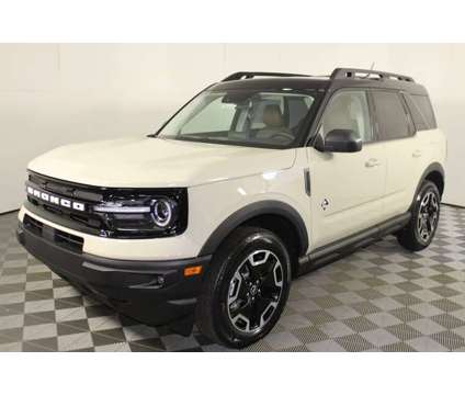 2024 Ford Bronco Sport Outer Banks is a Tan 2024 Ford Bronco SUV in Kansas City MO