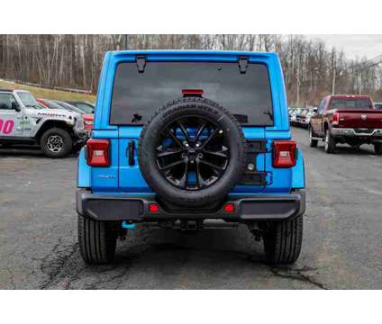 2024 Jeep Wrangler Sahara 4xe is a Blue 2024 Jeep Wrangler Sahara SUV in Granville NY
