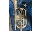Bach marching baritone, silver near perfect condition, with a case