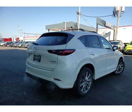 2024 Mazda CX-5 2.5 S Premium is a White 2024 Mazda CX-5 SUV in Elmhurst IL