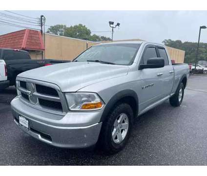 2011 Ram 1500 Quad Cab for sale is a Silver 2011 RAM 1500 Model Car for Sale in Vineland NJ