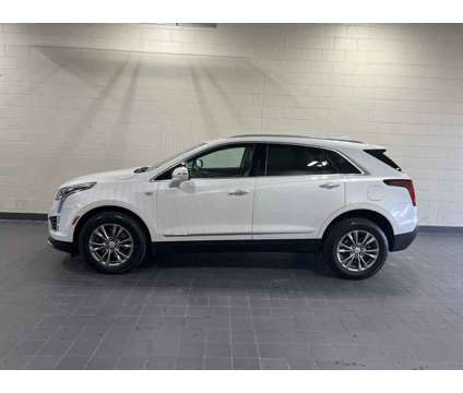 2021UsedCadillacUsedXT5Used4dr is a White 2021 Cadillac XT5 Car for Sale in Moline IL