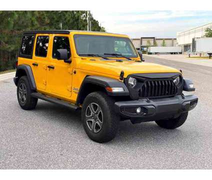 2019 Jeep Wrangler Unlimited for sale is a Yellow 2019 Jeep Wrangler Unlimited Car for Sale in Orlando FL
