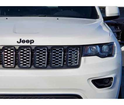 2021 Jeep Grand Cherokee Laredo X 4x4 is a White 2021 Jeep grand cherokee Laredo SUV in Brunswick OH