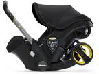 Doona Infant Car Seat & Latch Base - Rear Facing Car Seat to Stroller in Seconds