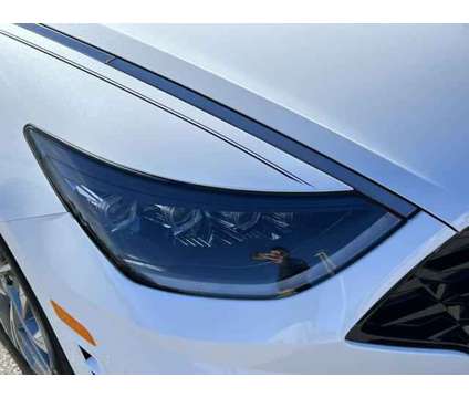 2023 Hyundai Sonata SEL is a White 2023 Hyundai Sonata Sedan in Leesburg FL