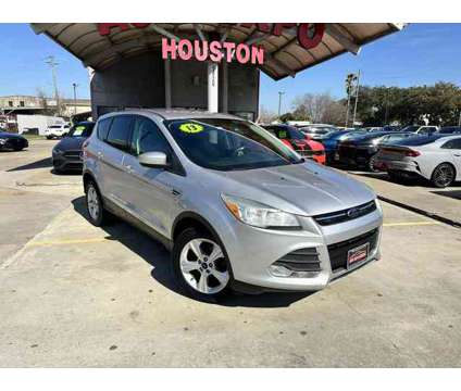 2013 Ford Escape for sale is a Silver 2013 Ford Escape Car for Sale in Houston TX