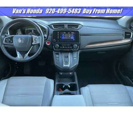 2022 Honda CR-V Hybrid EX-L is a Blue 2022 Honda CR-V Hybrid in Green Bay WI