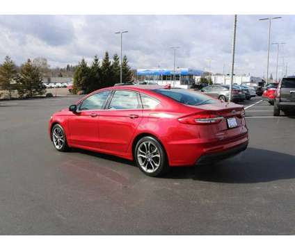 2020 Ford Fusion SEL is a Red 2020 Ford Fusion SEL Sedan in Battle Creek MI