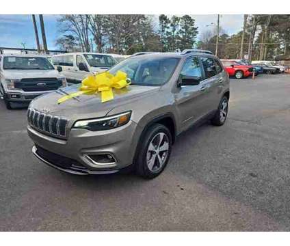 2019 Jeep Cherokee for sale is a Gold 2019 Jeep Cherokee Car for Sale in Marietta GA