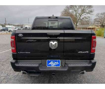 2024 Ram 1500 Limited is a Black 2024 RAM 1500 Model Limited Car for Sale in Winder GA