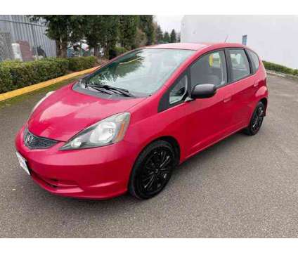 2010 Honda Fit Base is a Red 2010 Honda Fit Base Car for Sale in Woodinville WA