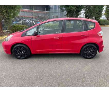 2010 Honda Fit Base is a Red 2010 Honda Fit Base Car for Sale in Woodinville WA