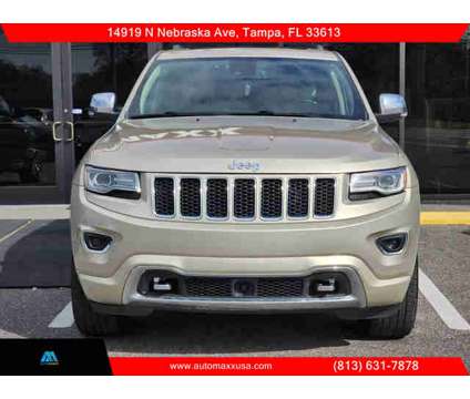2014 Jeep Grand Cherokee for sale is a Tan 2014 Jeep grand cherokee Car for Sale in Tampa FL