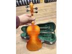 Used Violin 1/16. Includes: Violin, Case, Bow, Rosin.